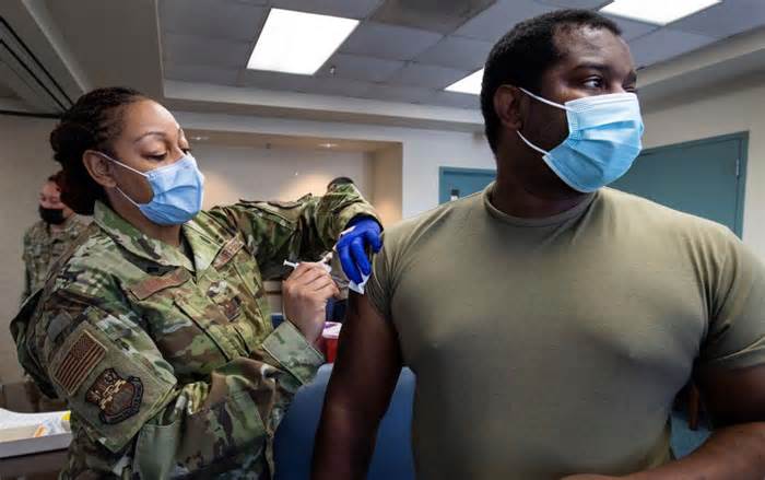 Military COVID-19 vaccine mandate repealed in defense bill compromise